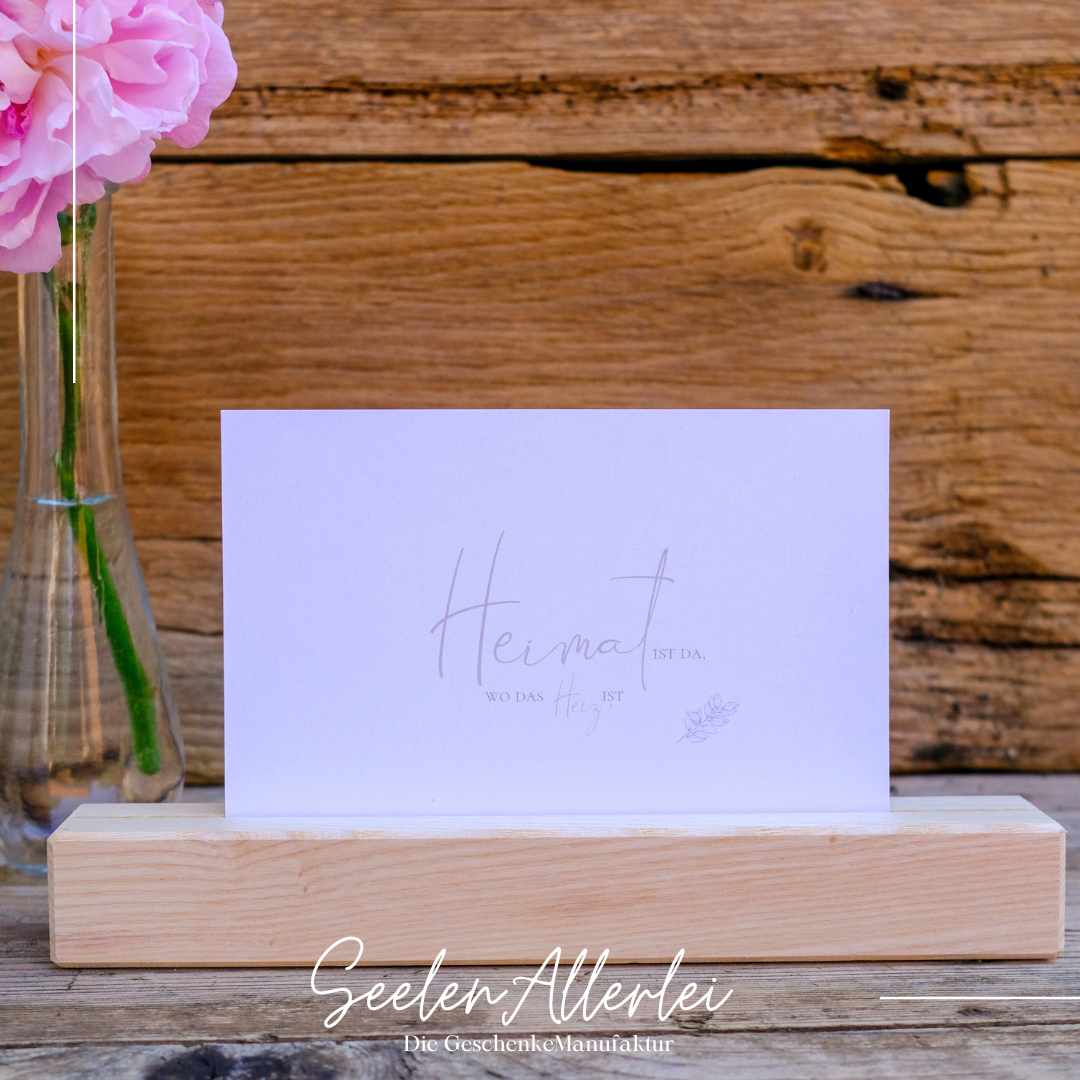 "Heimat ist da, wo das Herz ist." Postkarte